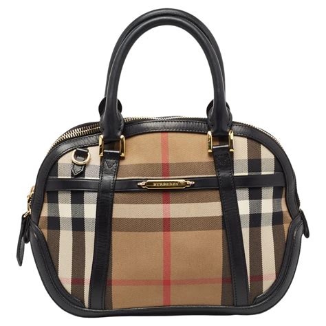 latest burberry bags|Burberry bags original price.